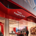Vue extérieure du flagship store Tesla avec un design moderne et épuré.