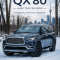 Vue latérale d'un INFINITI QX80 sur une route, mettant en avant son design élégant.