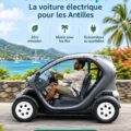 Renault Twizy 80 en plein paysage guadeloupéen, parfait pour une conduite électrique.
