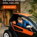 Renault Twizy garé dans une rue urbaine, mettant en avant son design compact et moderne.