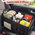 Une voiture bien rangée avec divers essentiels organisés sur le tableau de bord